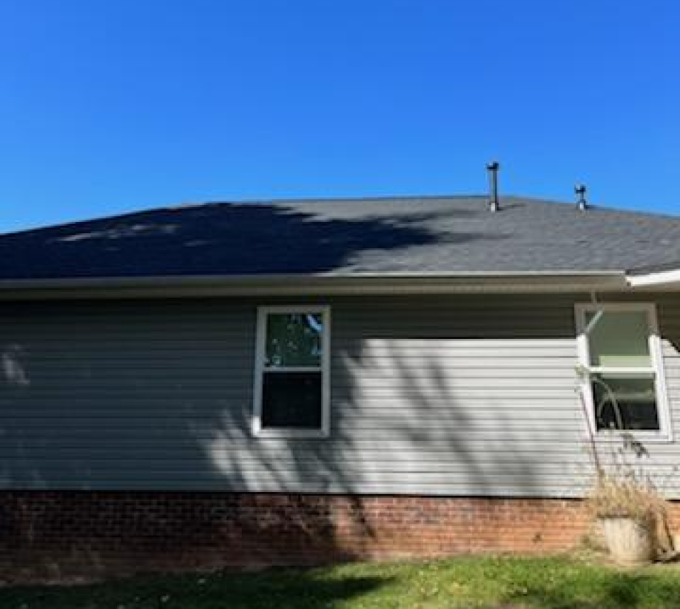Side of a house with grey siding